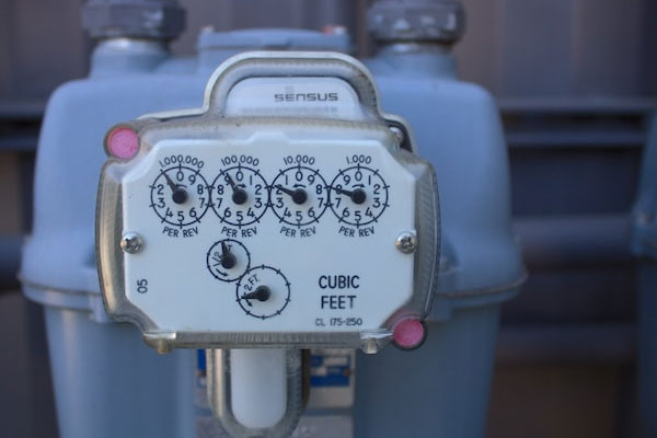 A gas meter displays the amount of gas being used by a home heating system following furnace installation in Calgary.
